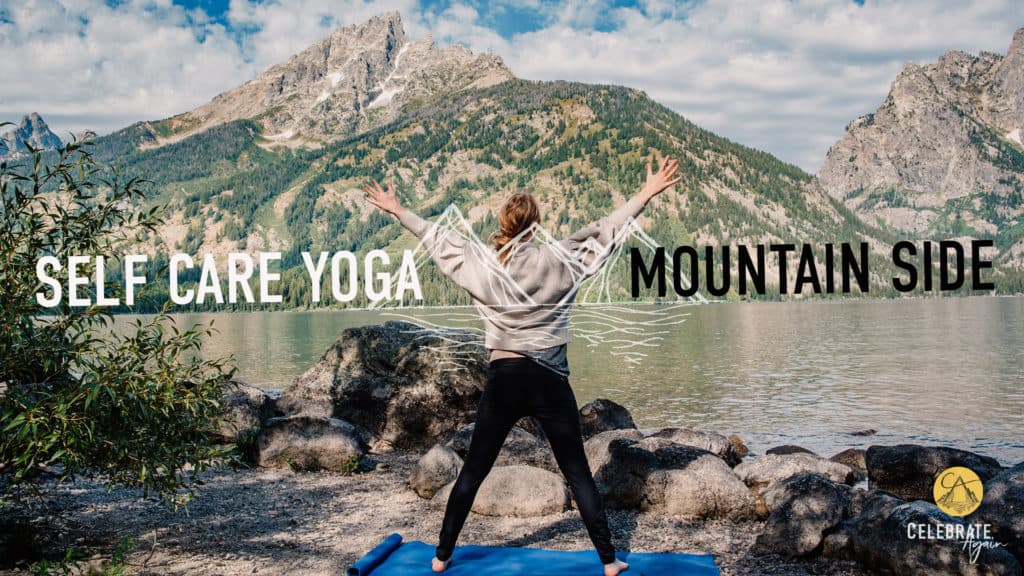 female standing on a yoga mat in star pose near a mountain side with text that says "self care yoga Mountain side yoga"