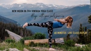 emmy standing on a mountain top in warrior three "new moon in armies vinyasa yoga class align with your souls journey 60 minute class replay"