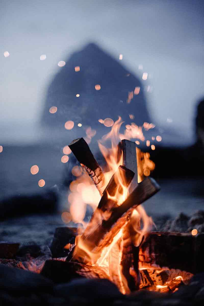 fire with sparks and sear rock behind