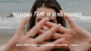 "releasing the fear of being punished" yoga breath work and kindred class over a photo of woman looking through hands pressed out on a beach