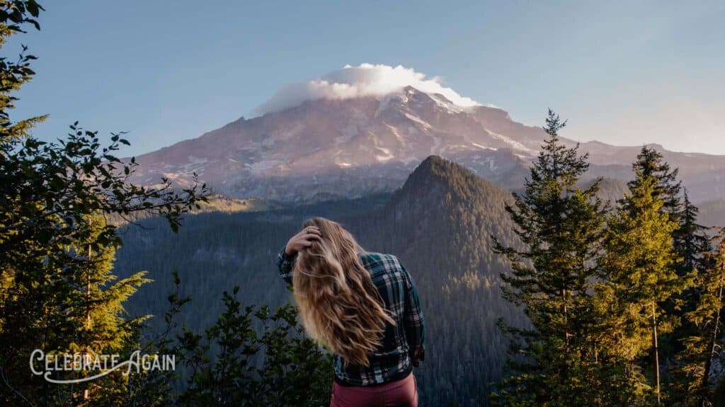 Woman in mountain background for poem about grief, longing and depression