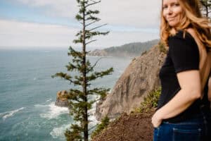 Lumalia standing on coast reflecting on Self-Abandonment in Relationships